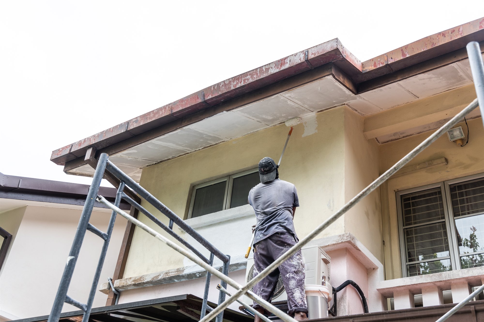 Exterior painting project on a townhouse facade